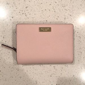 Brand new blush pink wallet! This was a gift but it’s not my style. Never used!